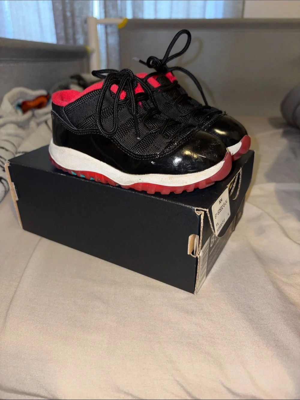 Jordan Kids Black and Red Retro Low Basketball Sneakers